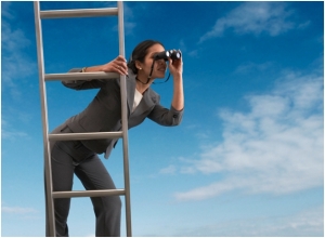 woman leader climbing ladder